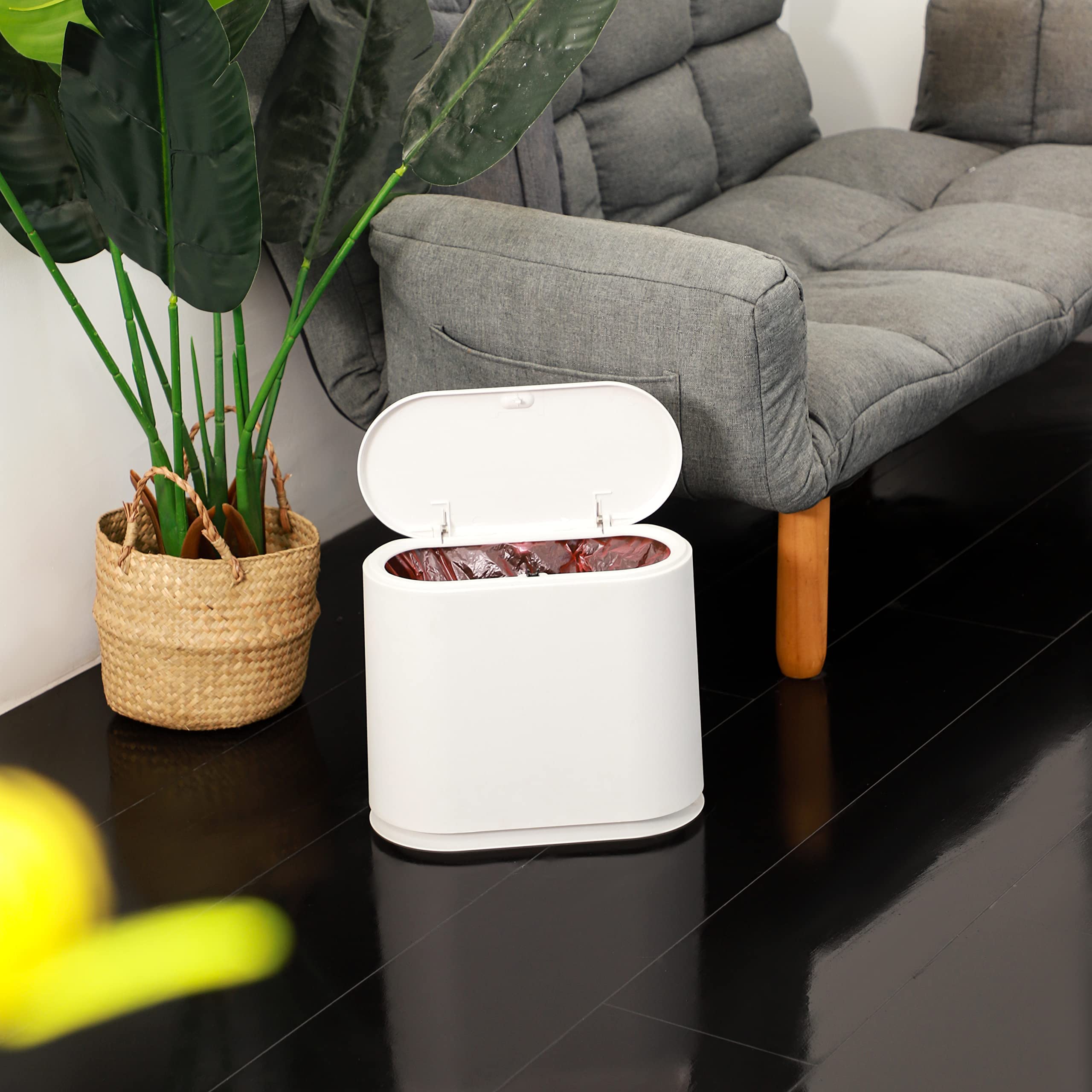 Cq Acrylic white wastebasket that wipes clean with a damp cloth