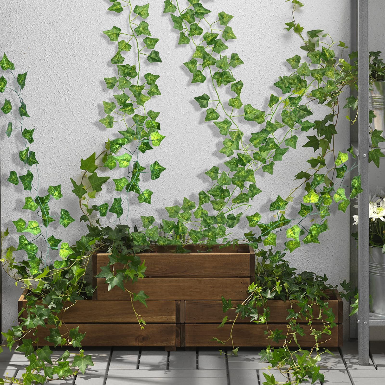 CQURE greenery garland on wall decor adds natural vibe.