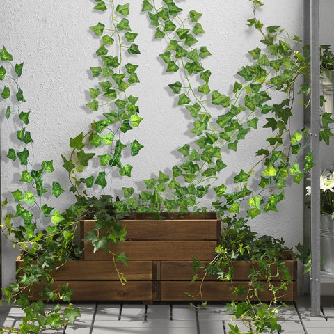 CQURE greenery garland on wall decor adds natural vibe.