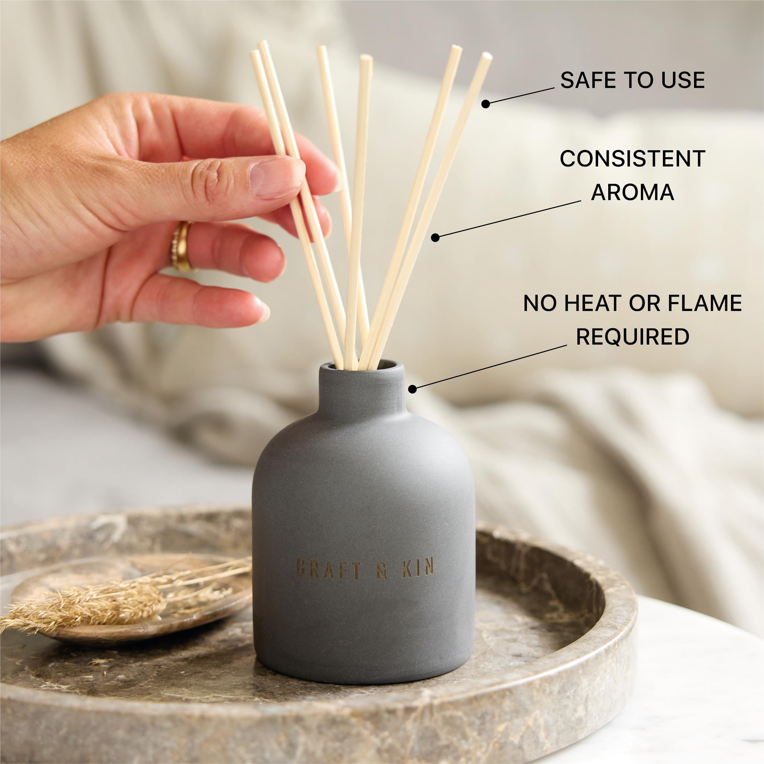 Close-up of diffuser sticks showing adjustable fragrance intensity