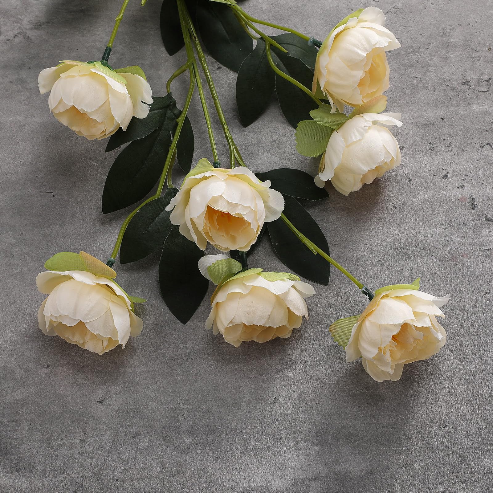 Craftsatin wedding centerpieces with 42 blooms offer timeless elegance.