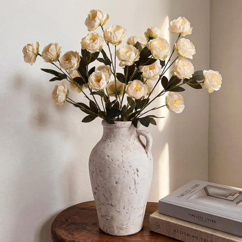 Craftsatin artificial peonies resist fading and require no watering.