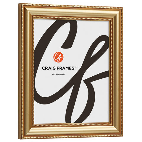 Craig Frames solid wood moulding closeup reveals ornate texture and antique finish.