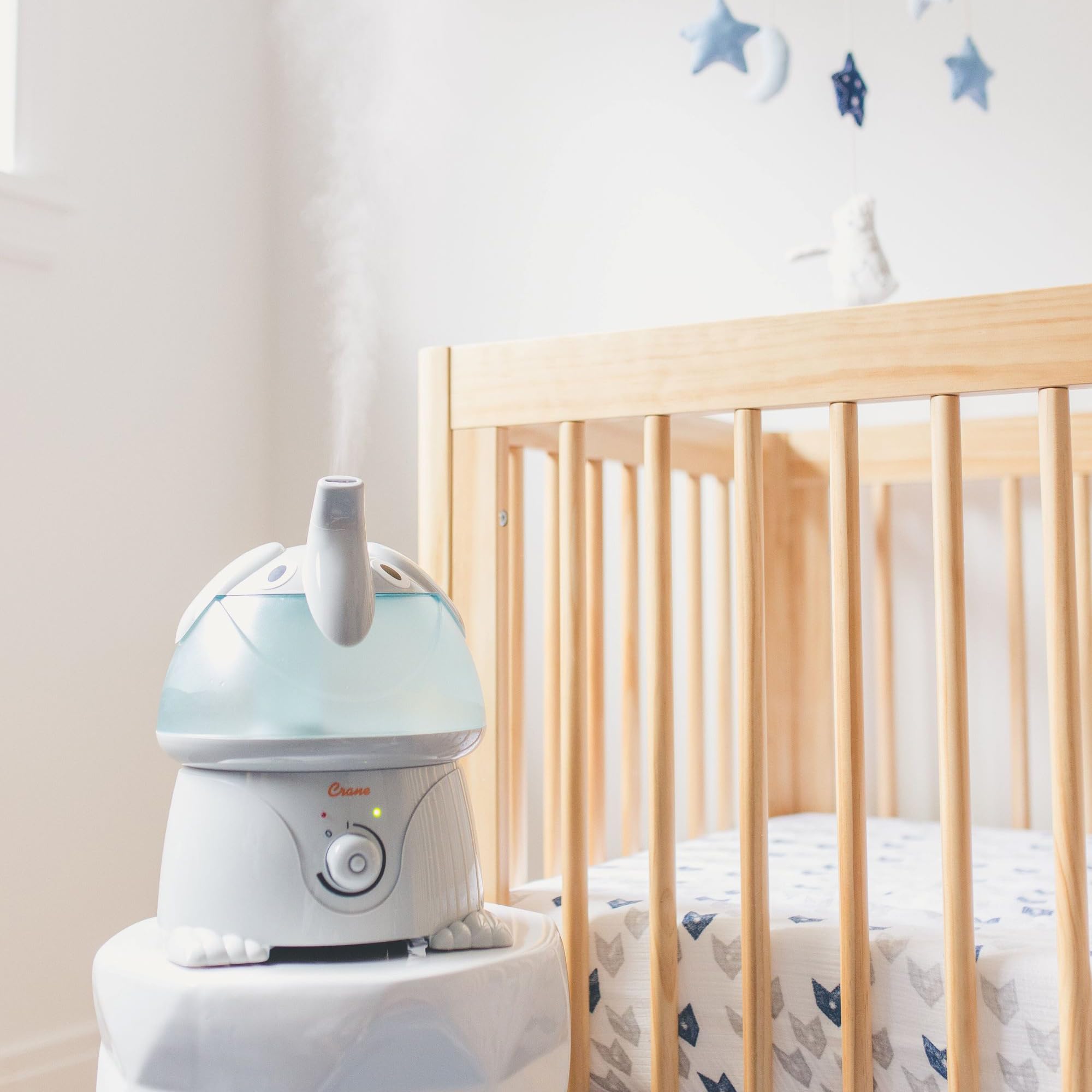 Crane BPA-free cool mist humidifier promotes safe, quiet room comfort