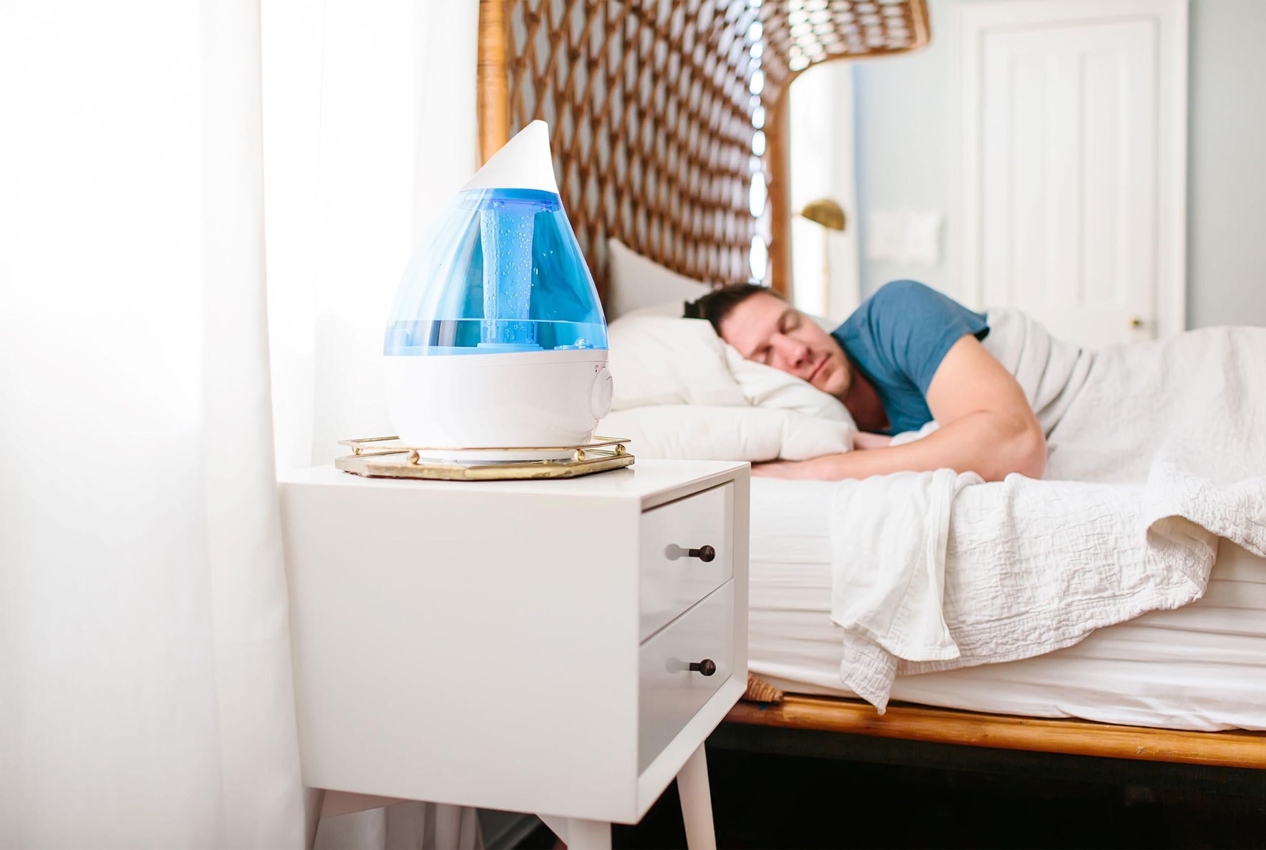Crane Drop compact bedside design fits nurseries and bedrooms.