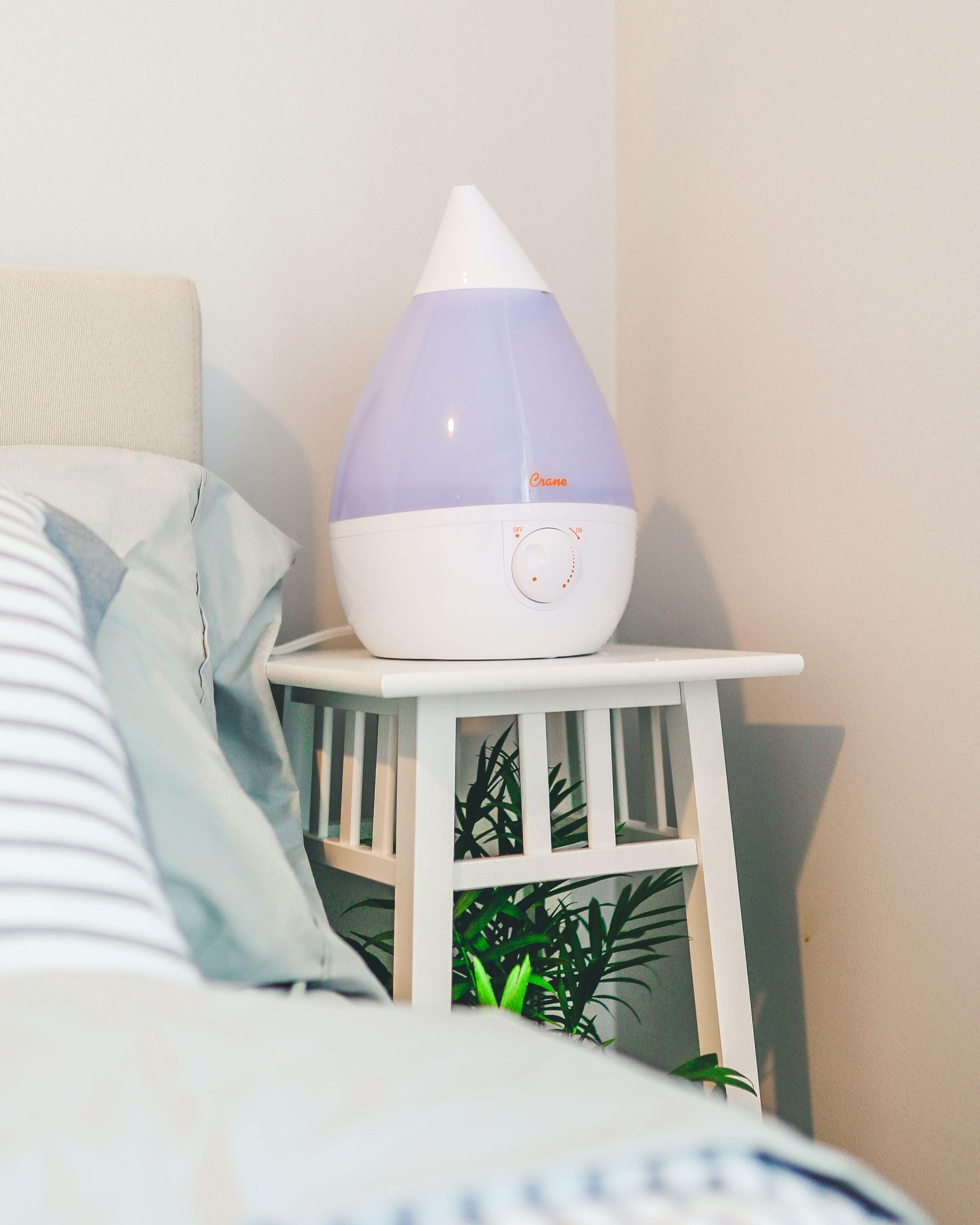 Crane Drop Shape humidifier operating in a nursery for quiet comfort.