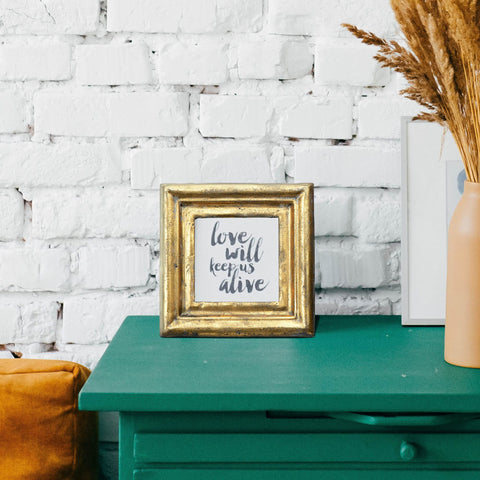 Creative Co-Op Antiqued Gold Square Frame close-up highlights textured finish for vintage photos