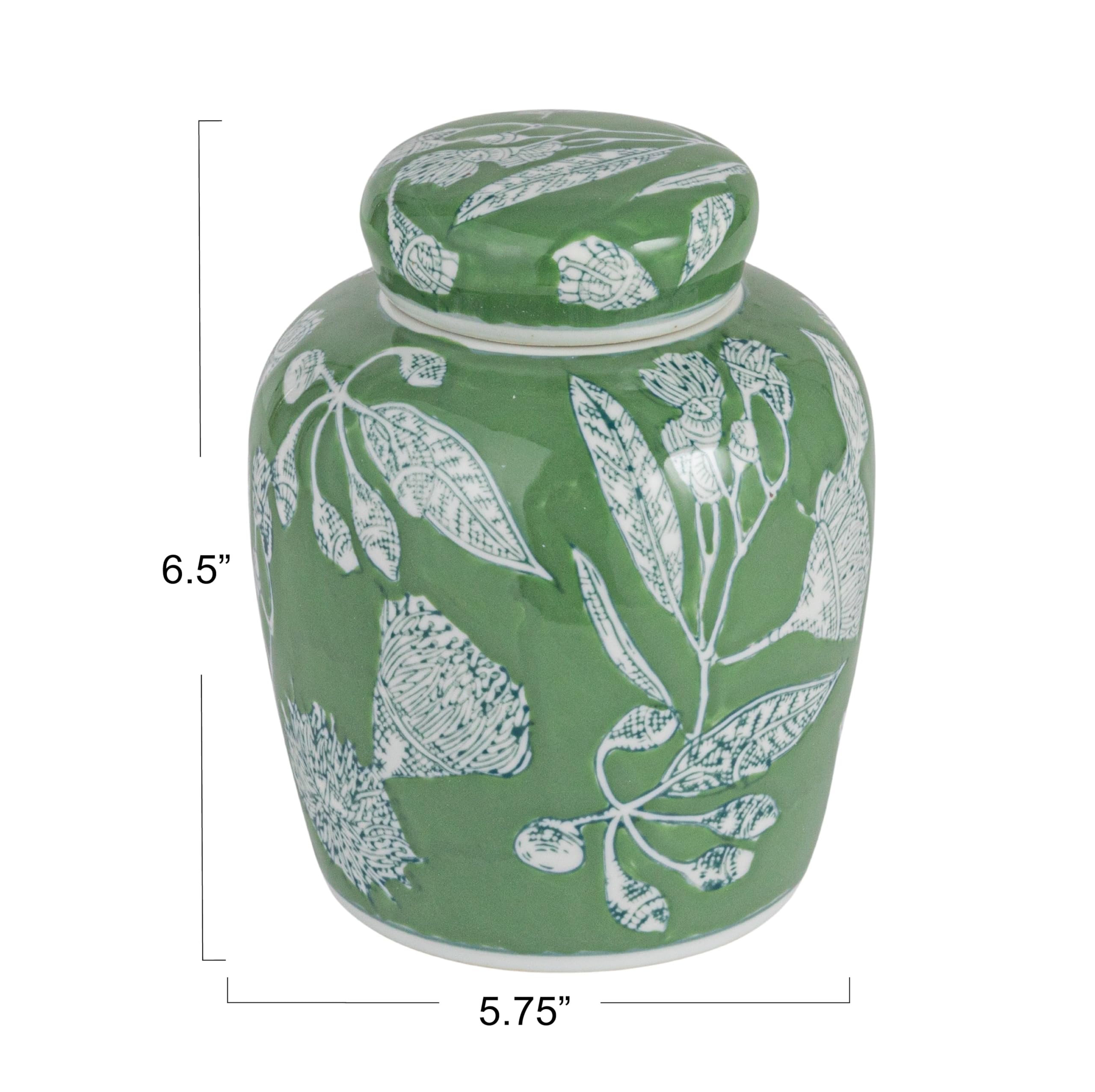 Creative Co-Op ginger jar close-up reveals green and white glaze with floral pattern.