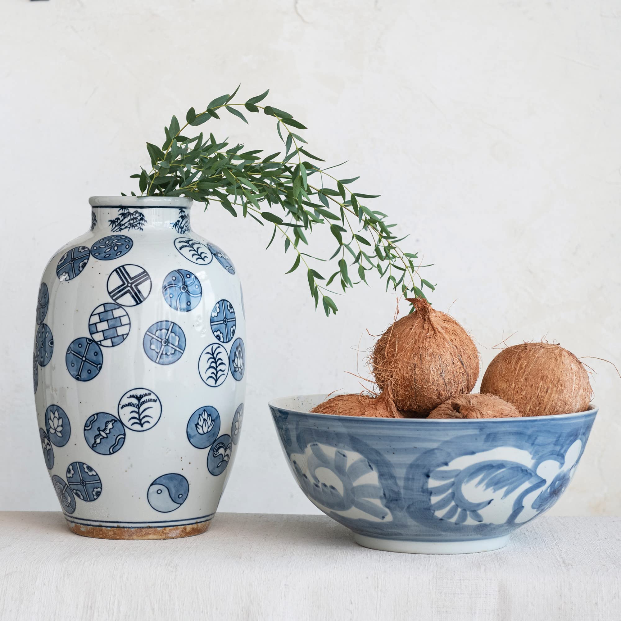 Creative Co-Op hand-painted stoneware bowl shown for decorative display and serving.