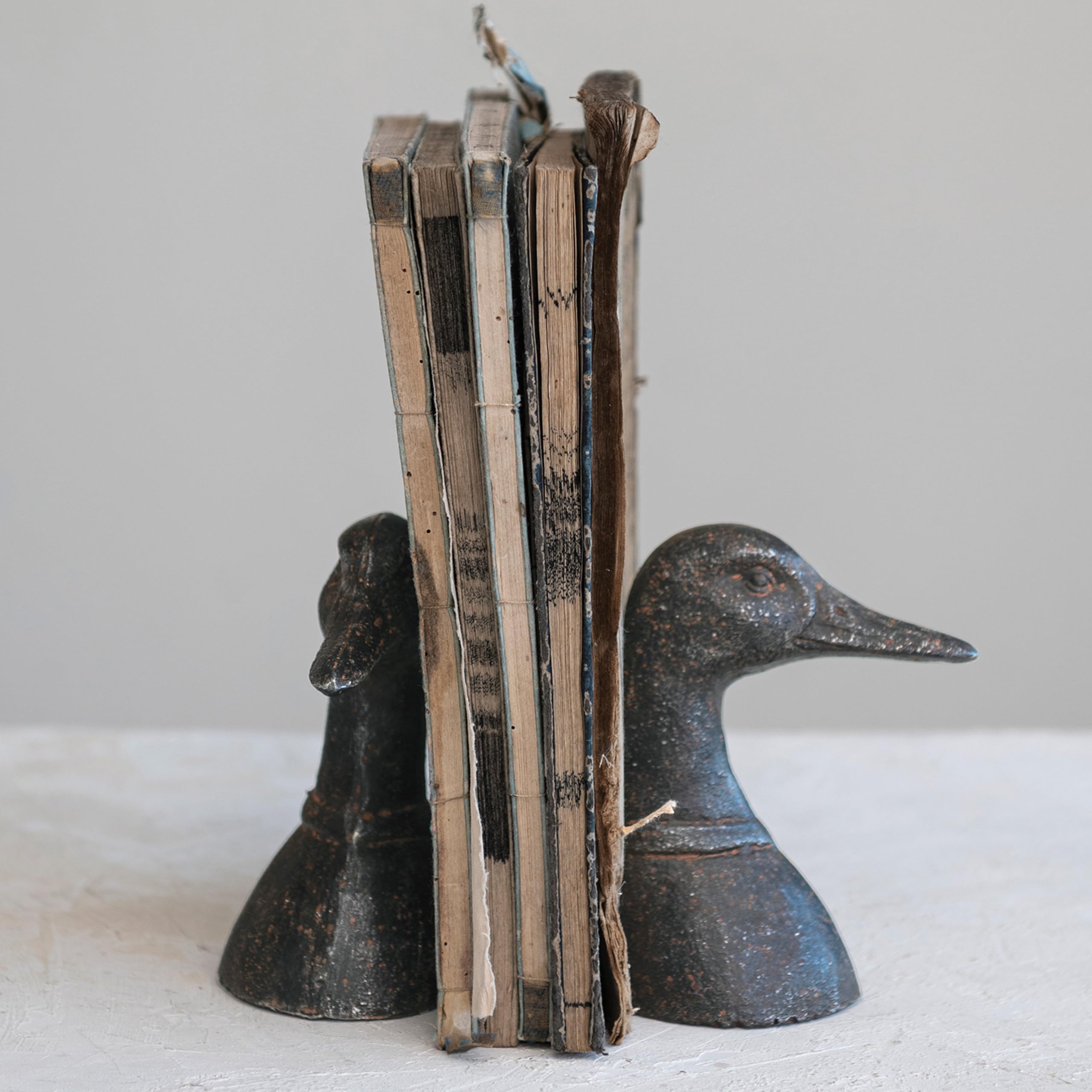 Creative Co-Op lodge-inspired decor duck head bookend for cozy shelves