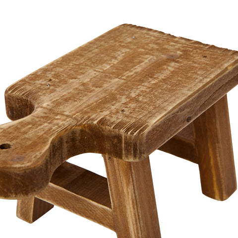 Creative Co-Op rustic-textured pedestal adds character to a display vignette.