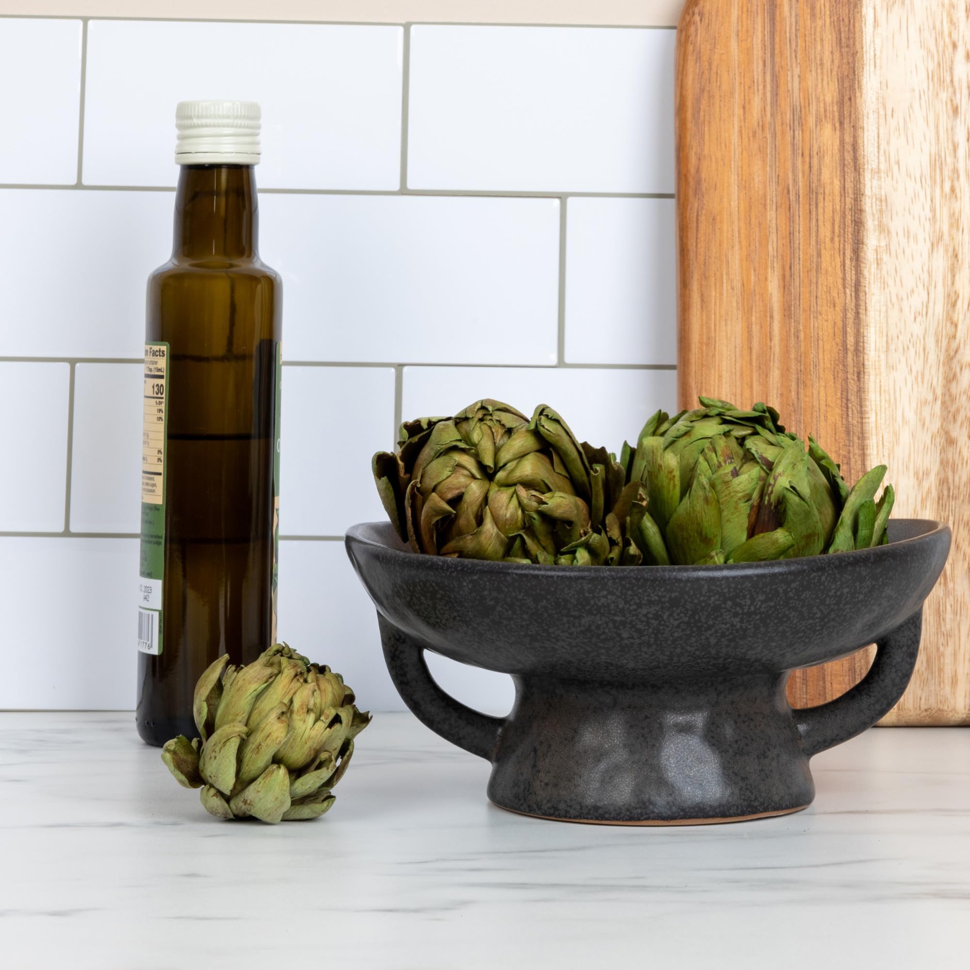 Creative Co-Op bowl side view emphasizes the sculptural base