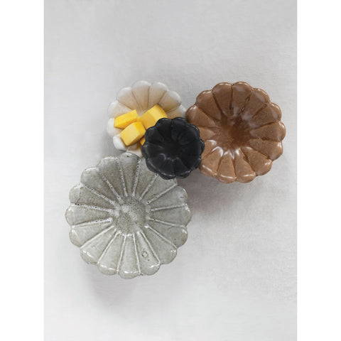 Creative Co-Op 3-inch flower bowl great for rings and earrings.