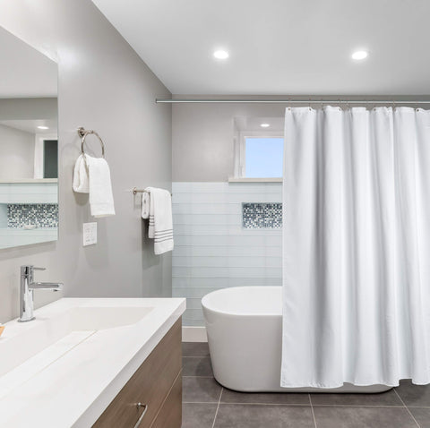 Creative Scents shower curtain close-up showing durable metal grommets.