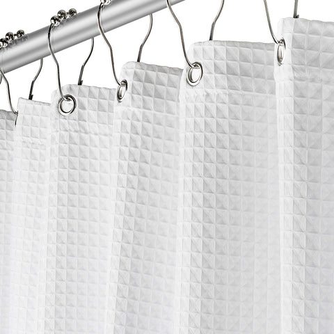 Creative Scents white waffle shower curtain with rust-free metal grommets for a spa-like bath.