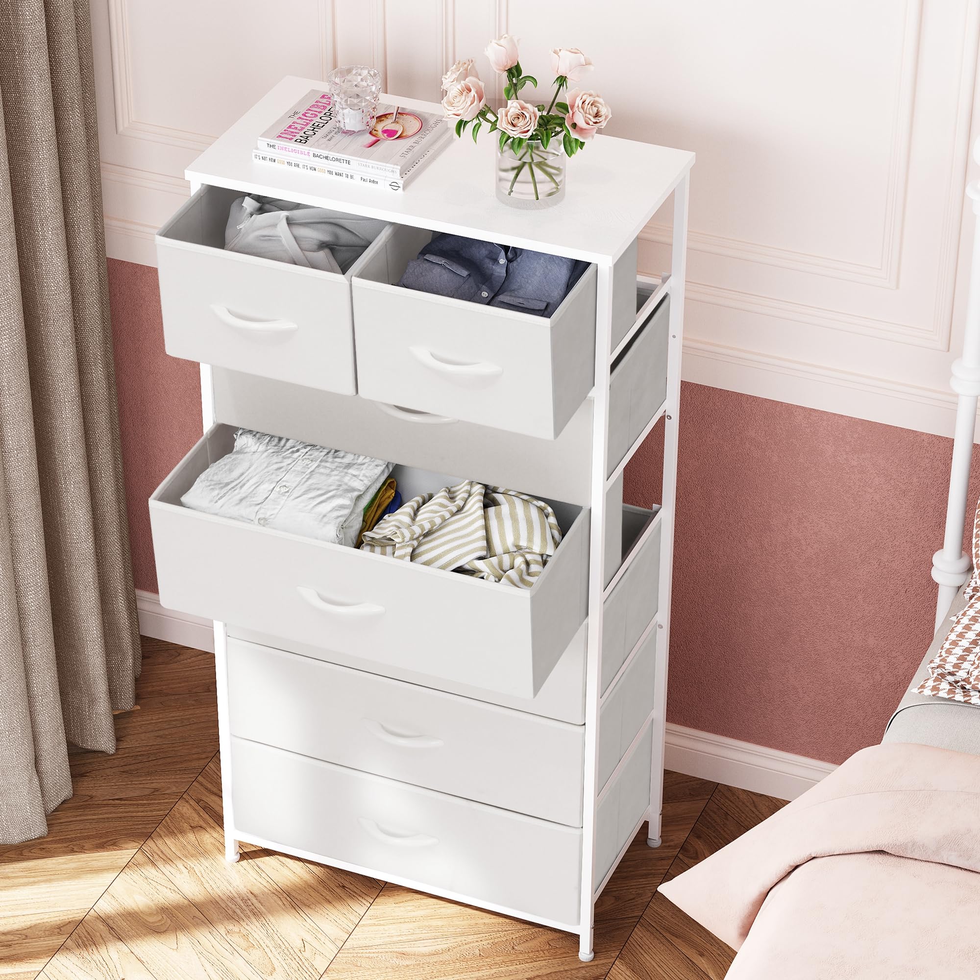 Removable fabric drawers provide easy access to clothing and accessories.