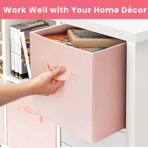 Criusia pink storage cubes organize towels, toys, and linens in a tidy closet.