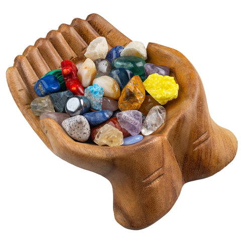 Curawood carved hands offering bowl crystal holder displaying crystals with natural elegance.