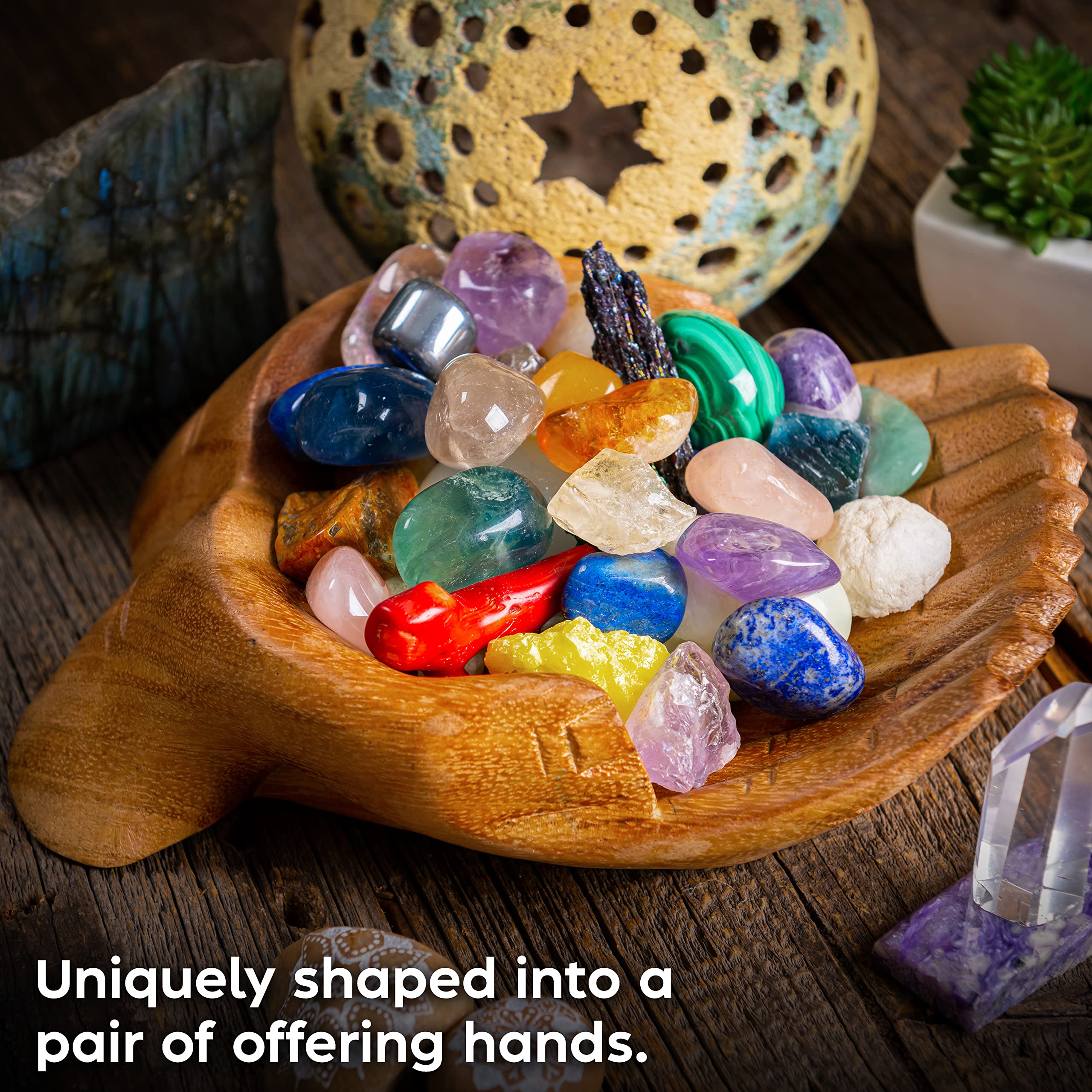 Curawood crystal display stand with hands highlights sacred storage options.