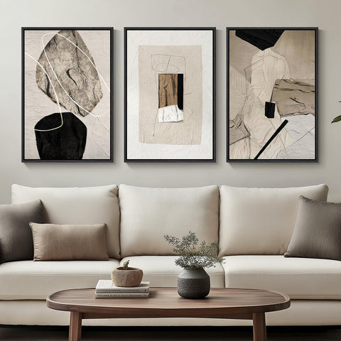 Cuspin 3-piece framed neutral abstract wall art set on living room wall; adds calm and modern appeal.