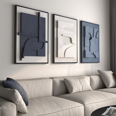 Cuspin large 3D textured framed wall art in blue and white abstract, adds depth to living room wall.