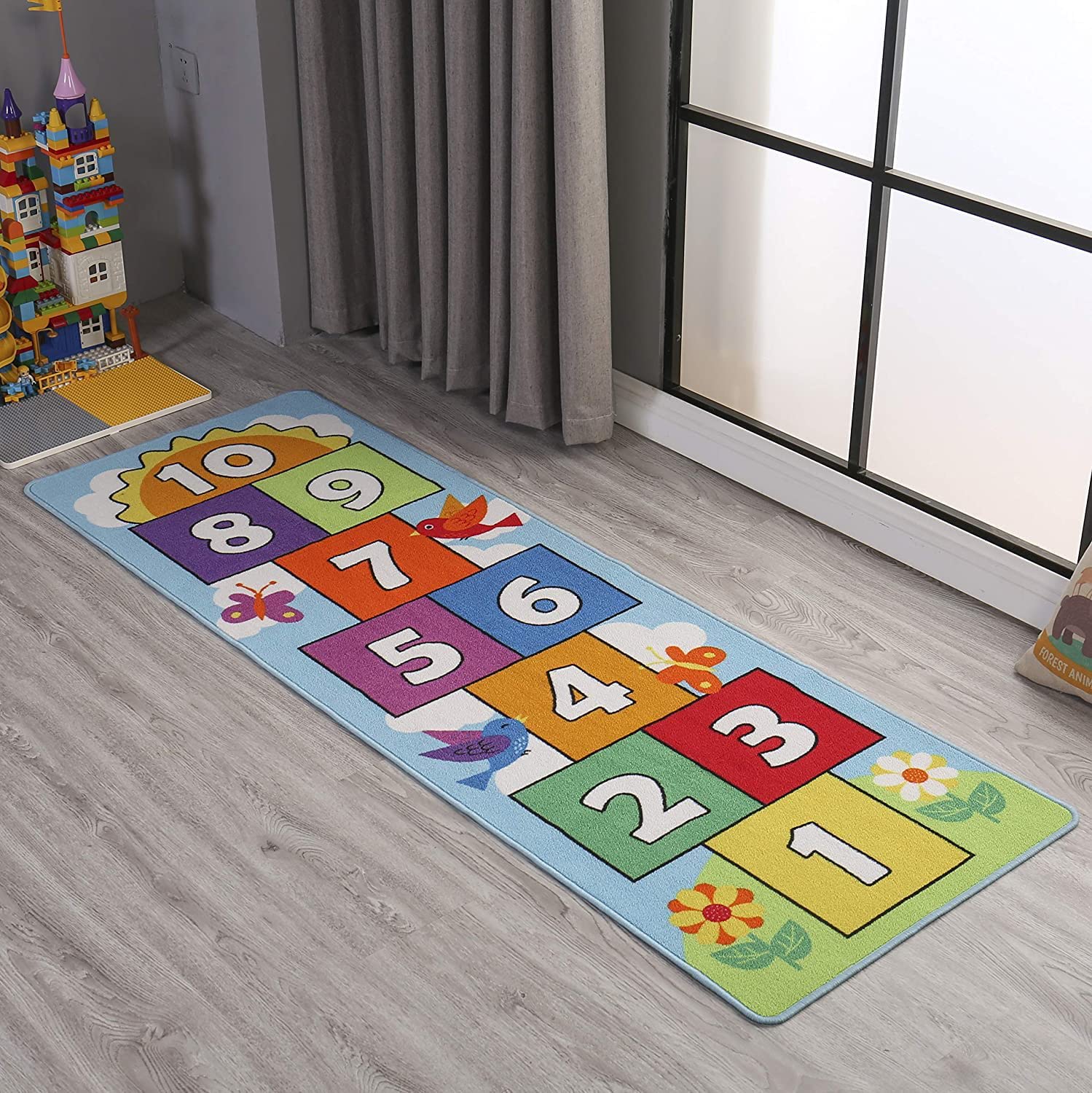 Dafina Hopscotch Rug kids playing promoting movement and number recognition.