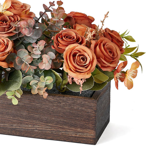 Dahey eucalyptus branches enhance contrast with the flowers