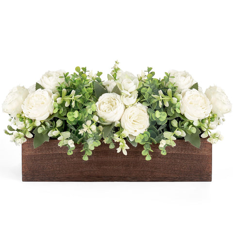Dahey centerpiece on a wood tray with flowers and eucalyptus for elegant dining decor.