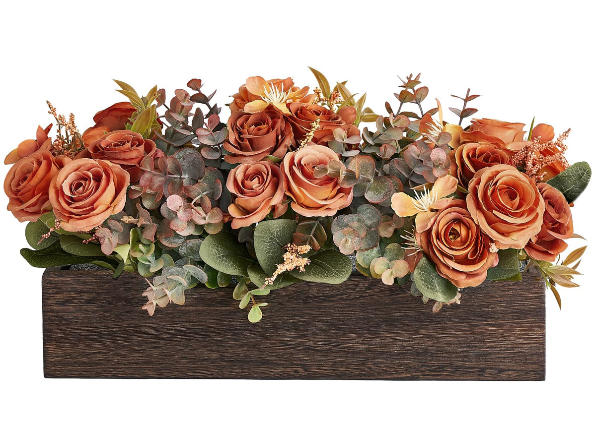 Dahey wood box centerpiece on a table adds a warm focal point