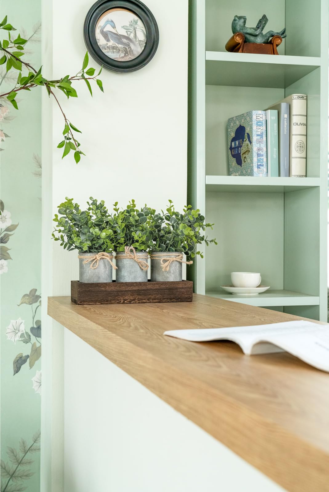Dahey galvanized pots and eucalyptus can elevate a shelf or countertop decor
