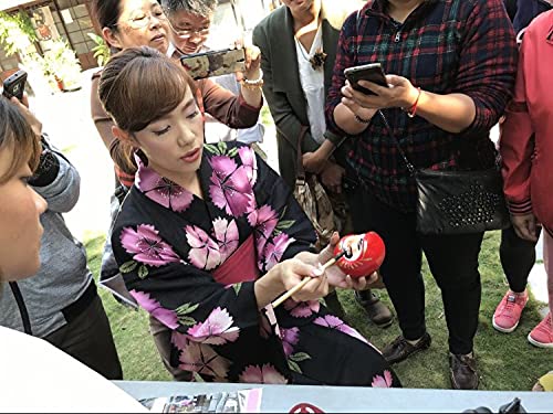 Daimonya red Daruma doll symbolizing good fortune and protection