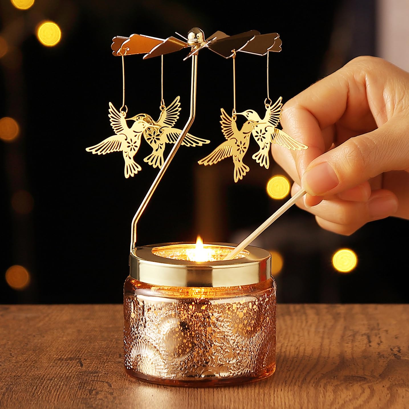 DAISRED hummingbird candle blades in motion highlight kinetic ambiance.