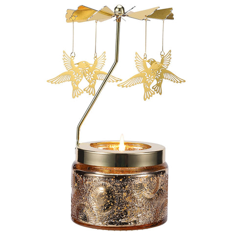 DAISRED hummingbird rotating candle in full view, a unique decor centerpiece.