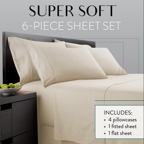Danjor Linens two cream pillowcases sit on bed for a coordinated hotel-style look.