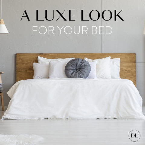 Danjor Linens ice blue hotel-inspired look on a well-made bed