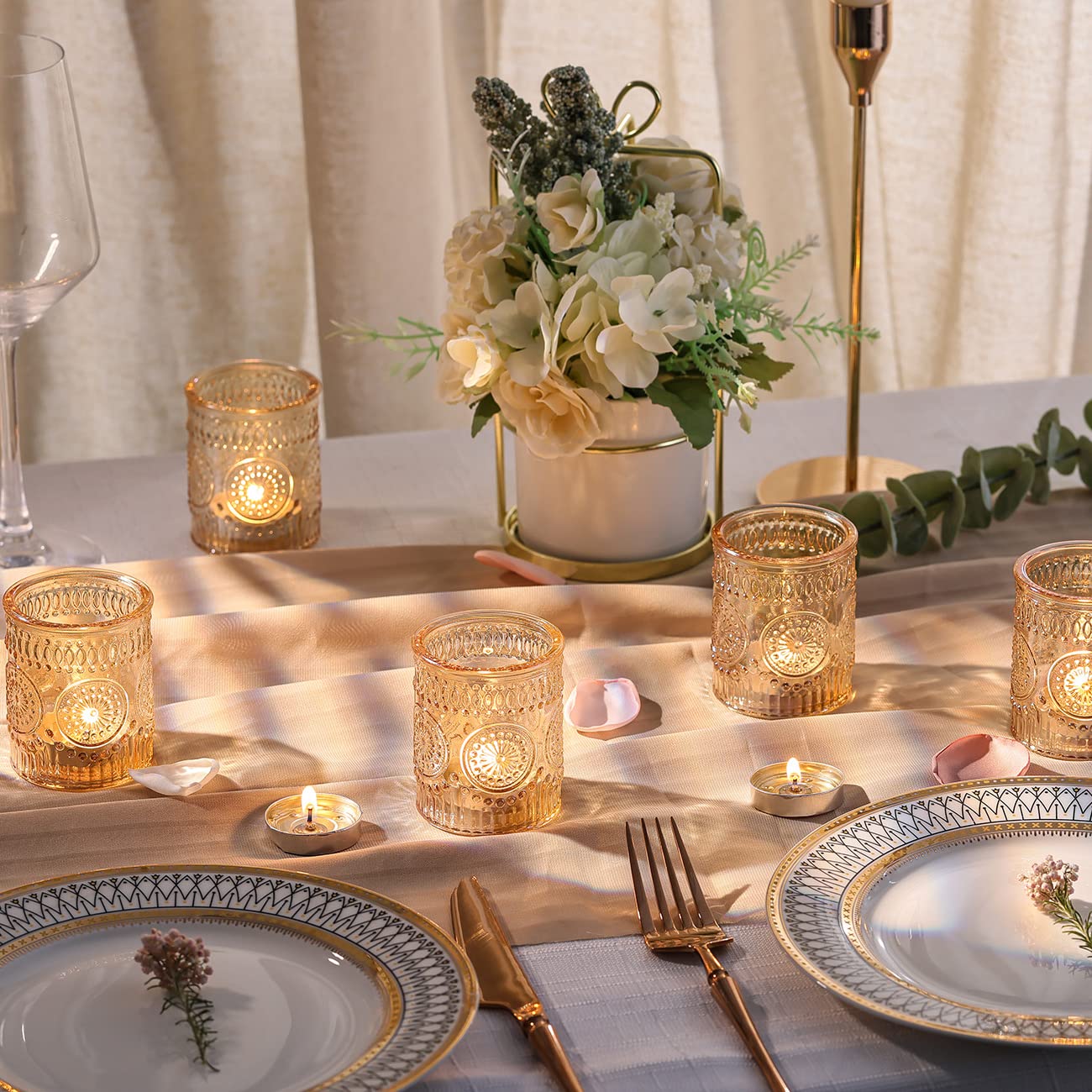 DARJEN candle holders decorate spaces or double as small planters.