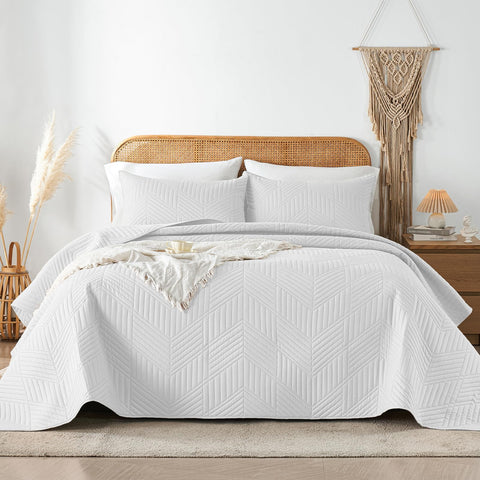 Davulos king quilt with embossed pattern adds boho charm to your bed.