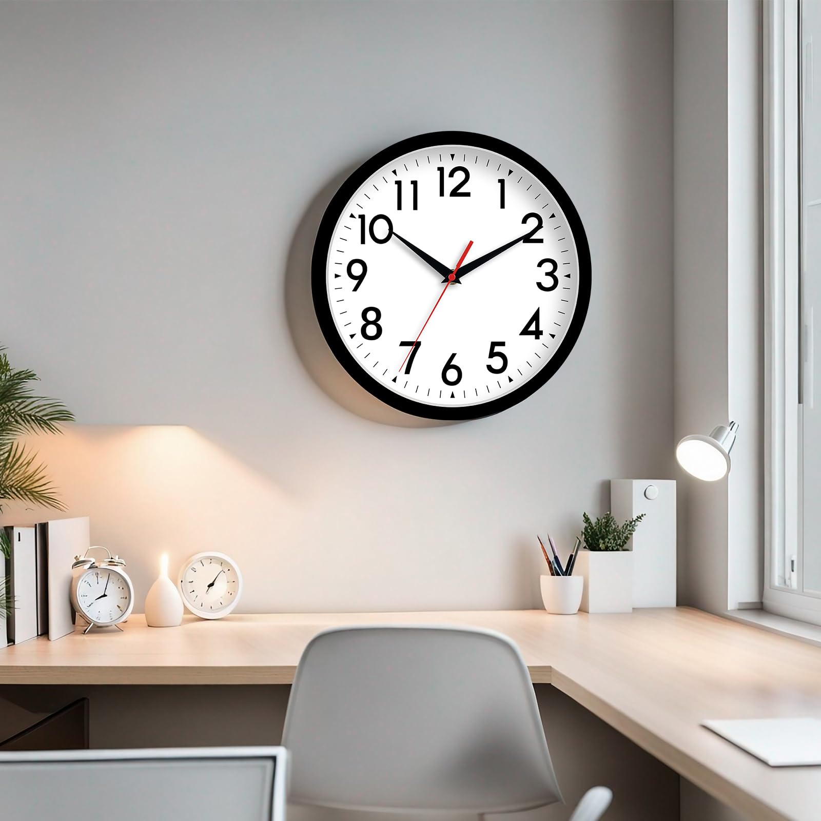 DAXSMY 14-inch wall clock battery-powered design runs on a single AA.