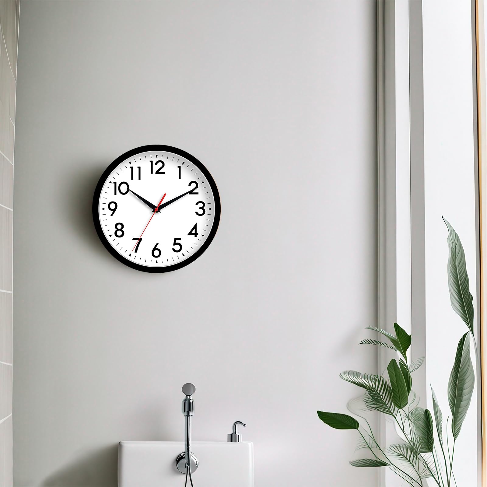 DAXSMY 14-inch wall clock black finish complements modern spaces.
