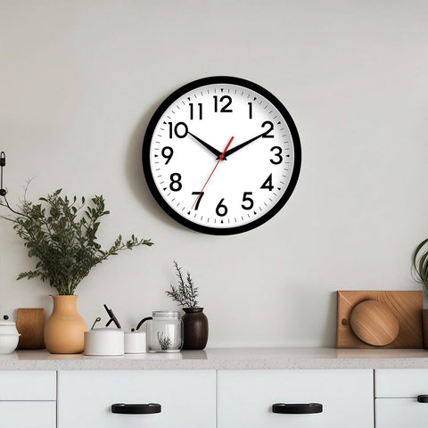 DAXSMY 14-inch wall clock with clear numbers enables readable time from distance.