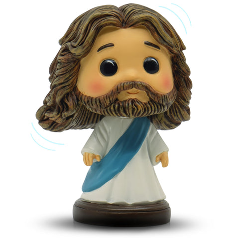 DECCED Jesus bobblehead on blue dashboard offering gentle daily inspiration.