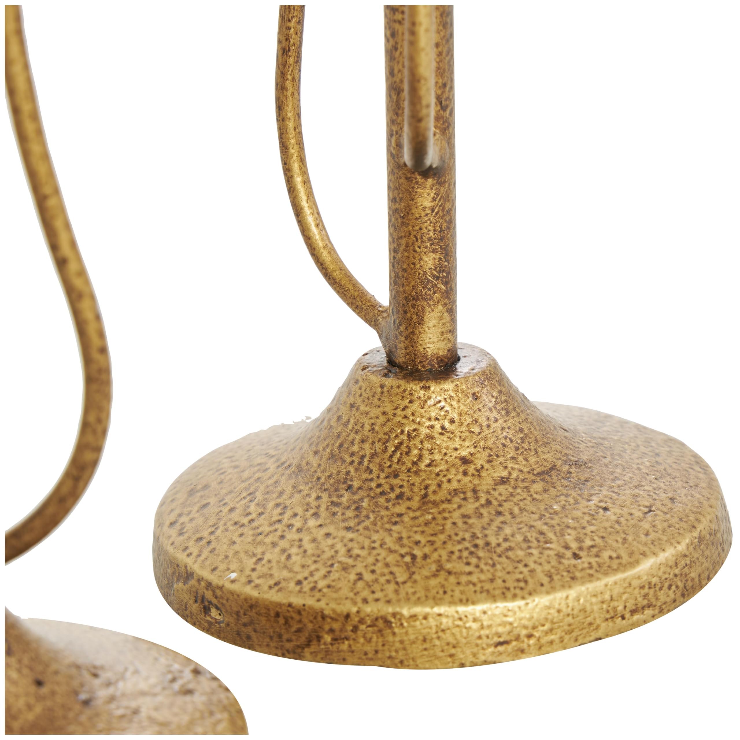 Abstract mushroom motif on Deco 79 gold candle holder for home decor