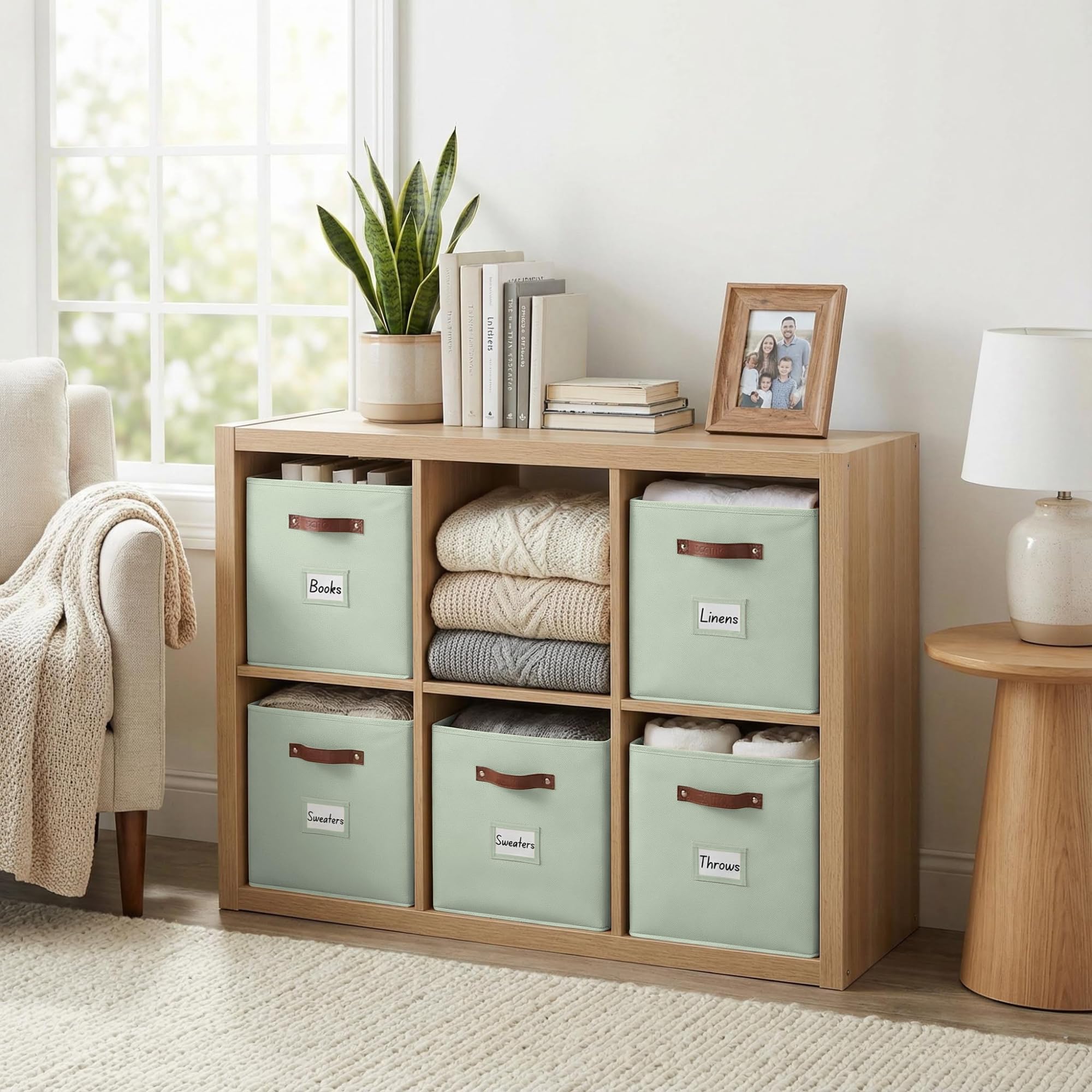 DECOMOMO four-pack storage bins in sage green for coordinated shelving.