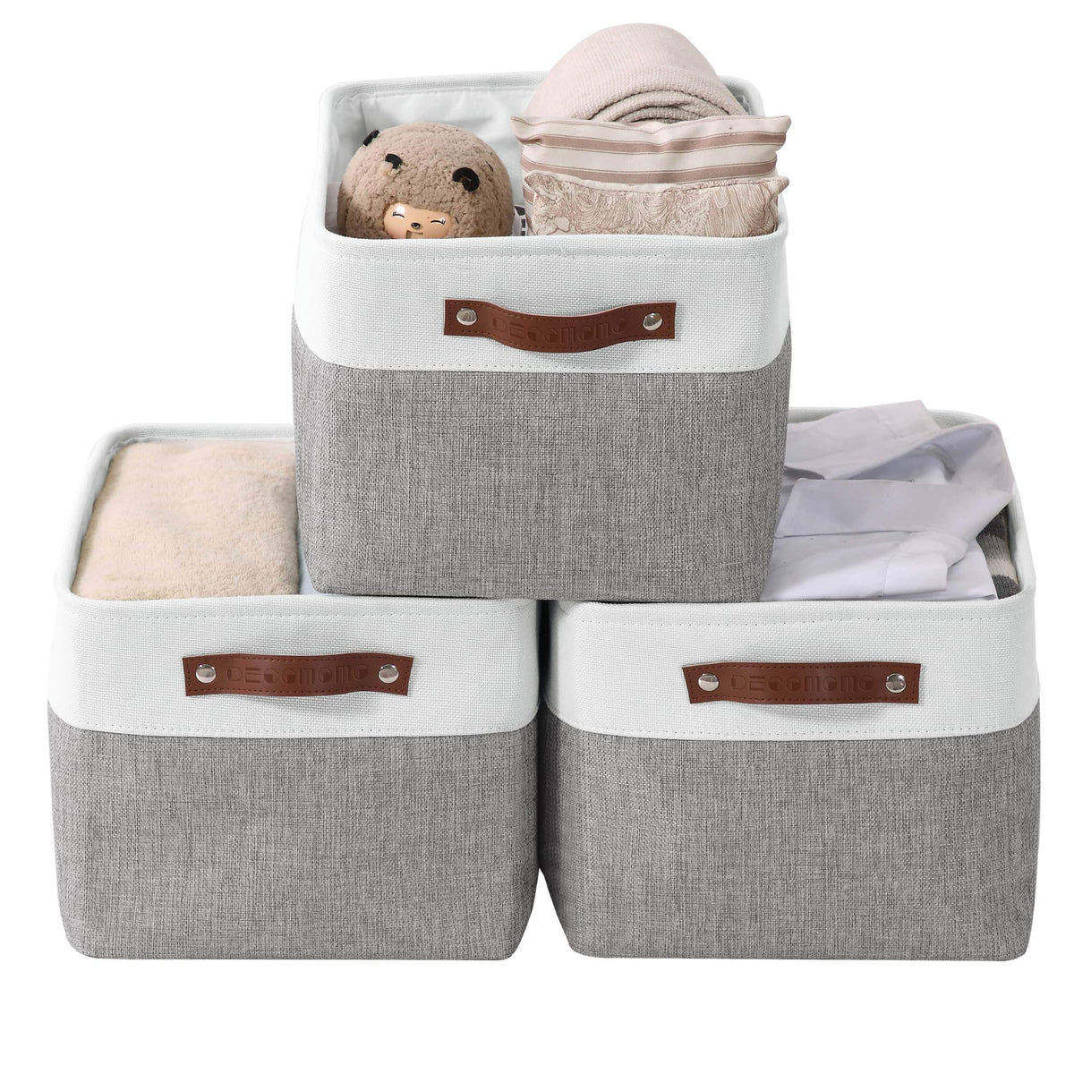 DECOMOMO storage bins in grey and white on a shelf for organized storage