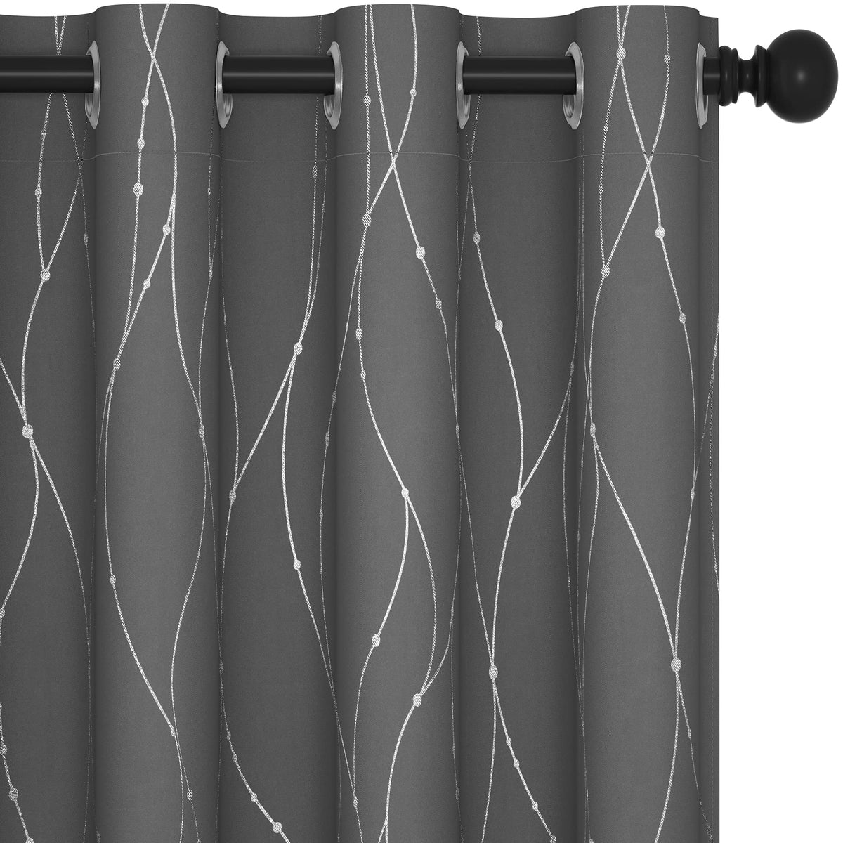 Deconovo blackout curtains with a silver foil print block light while adding a chic shimmer.