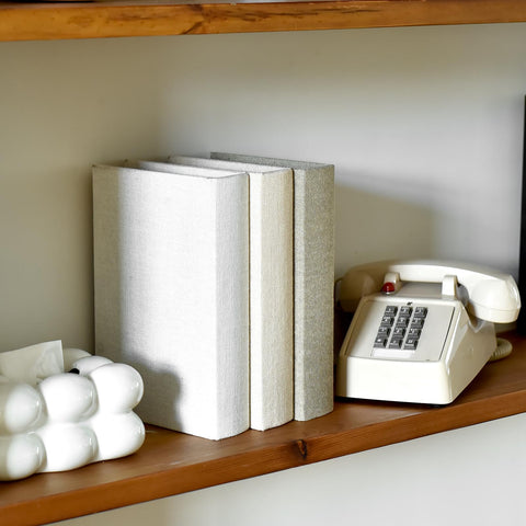 DECOR4SEASON living room vignette with book boxes adding warmth