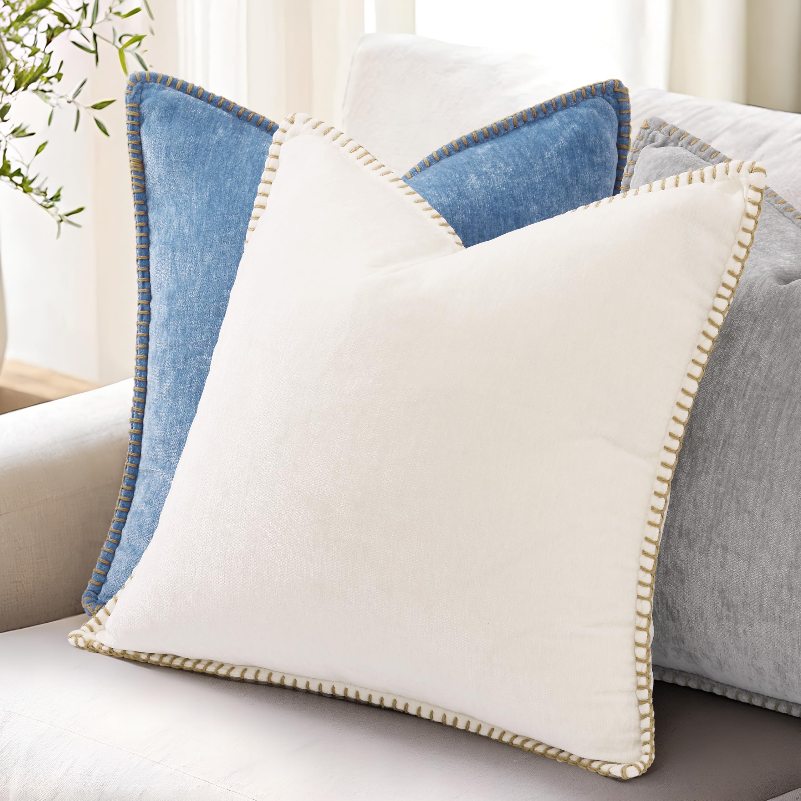 decorUhome blue pillow cover in a bedroom setup for cozy decor.