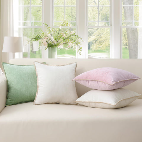decorUhome pillow cover on couch elevates living room with cozy texture.