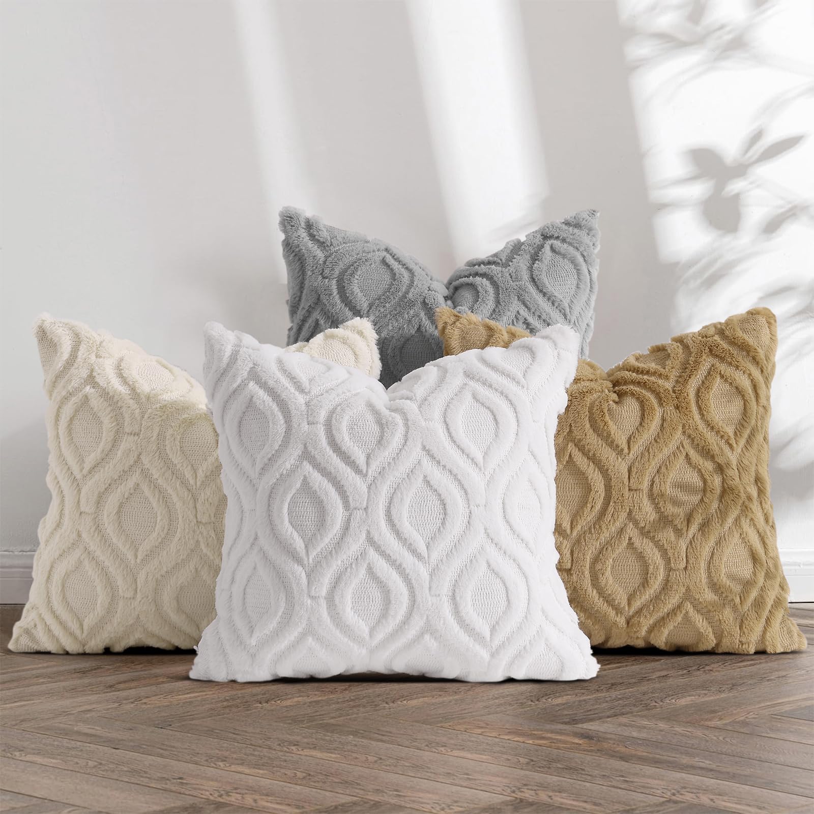 decorUhome sofa or bed styling with beige pillow covers for a calm space