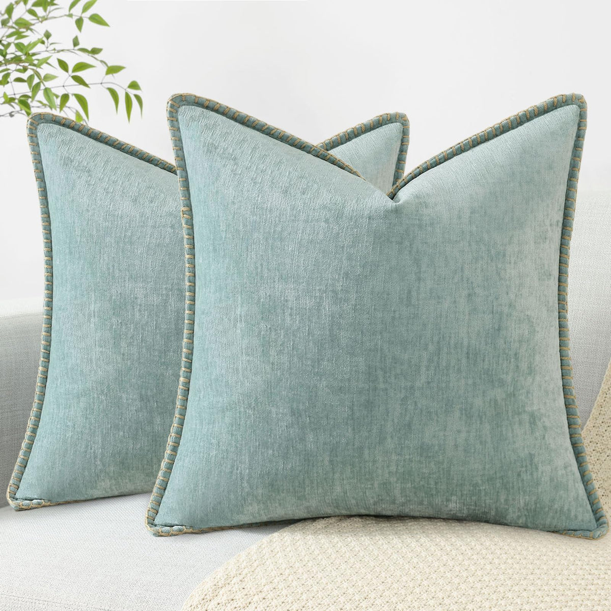 decorUhome Summer Chenille pillow cover 20x20 in Aqua Haze adds cozy farmhouse charm to the sofa.